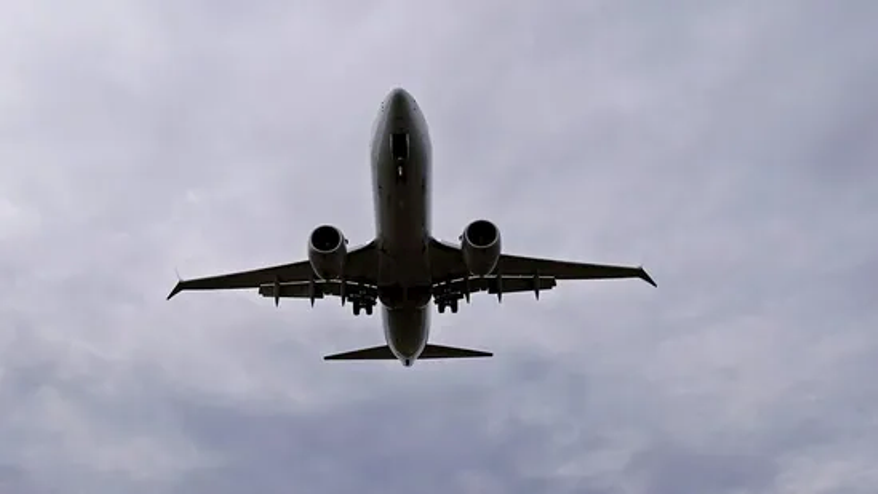 US airliner turns back in mid-flight after passenger defies face mask rule