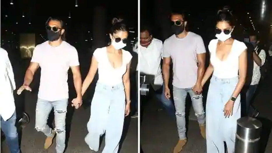 Ranveer, Deepika twin in white as they arrive in Mumbai hand-in-hand